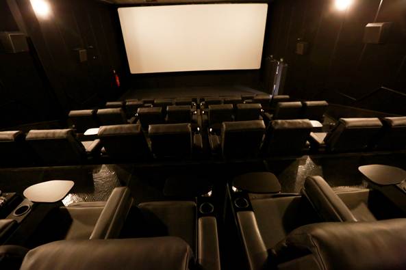 EspaçSala de cinema com telão