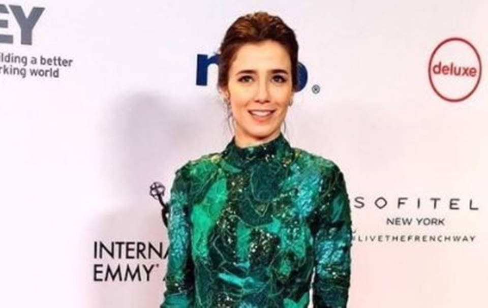 Foto colorida de Marjorie Estiano com vestido verde - Metrópoles