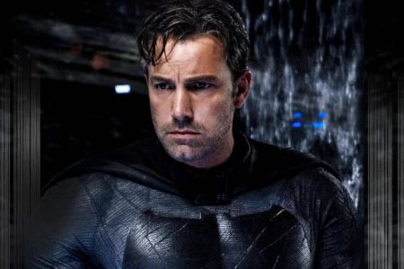 Batman aparece uniformizado no centro da imagem-Metrópoles