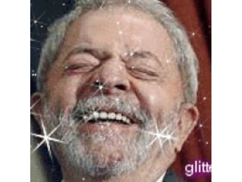 GIF de Lula rindo com filtro de brilho - Metrópoles