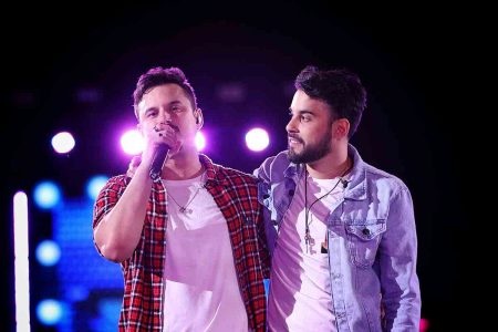 Foto de Clayton e Romário em show de gravação de DVD