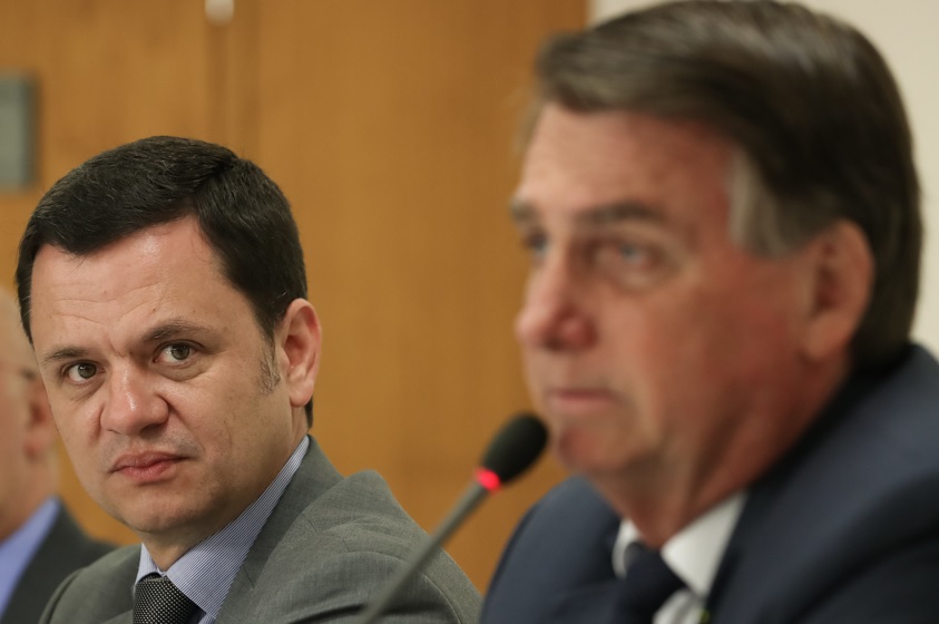 Anderson Torres, então ministro da Justiça, durante reunião com Jair Bolsonaro Eduardo Bolsonaro