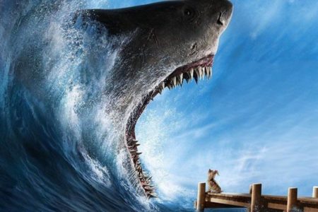 Imagem colorida de um tubarão pronto para devorar um cachorrinho. Cena do filme Megatubarão 2 - Metrópoles