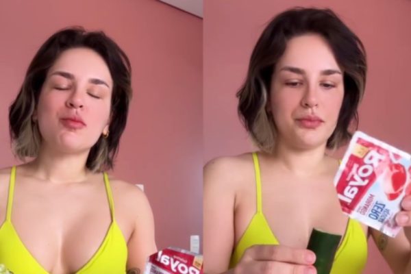 Foto colorida de uma mulher comendo pepino com gelatina - Metrópoles