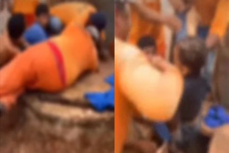 Reeducandos ajudando criança que caiu em poço