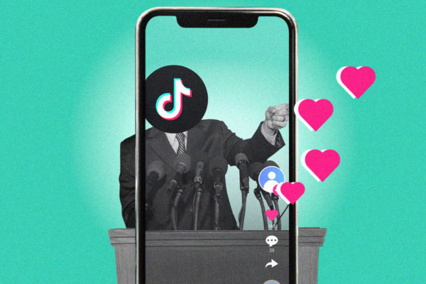 imagem colorida. político no palanque enquanto faz live no TikTok