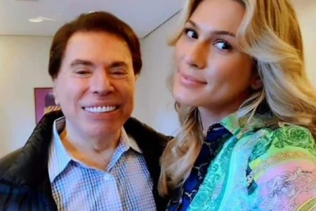 Foto colorida de Lívia Andrade e Silvio Santos - Metrópoles
