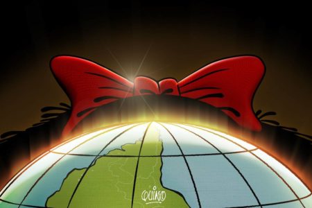 A imagem colorida mostra um laço vermelho em cima do planeta - Metrópoles