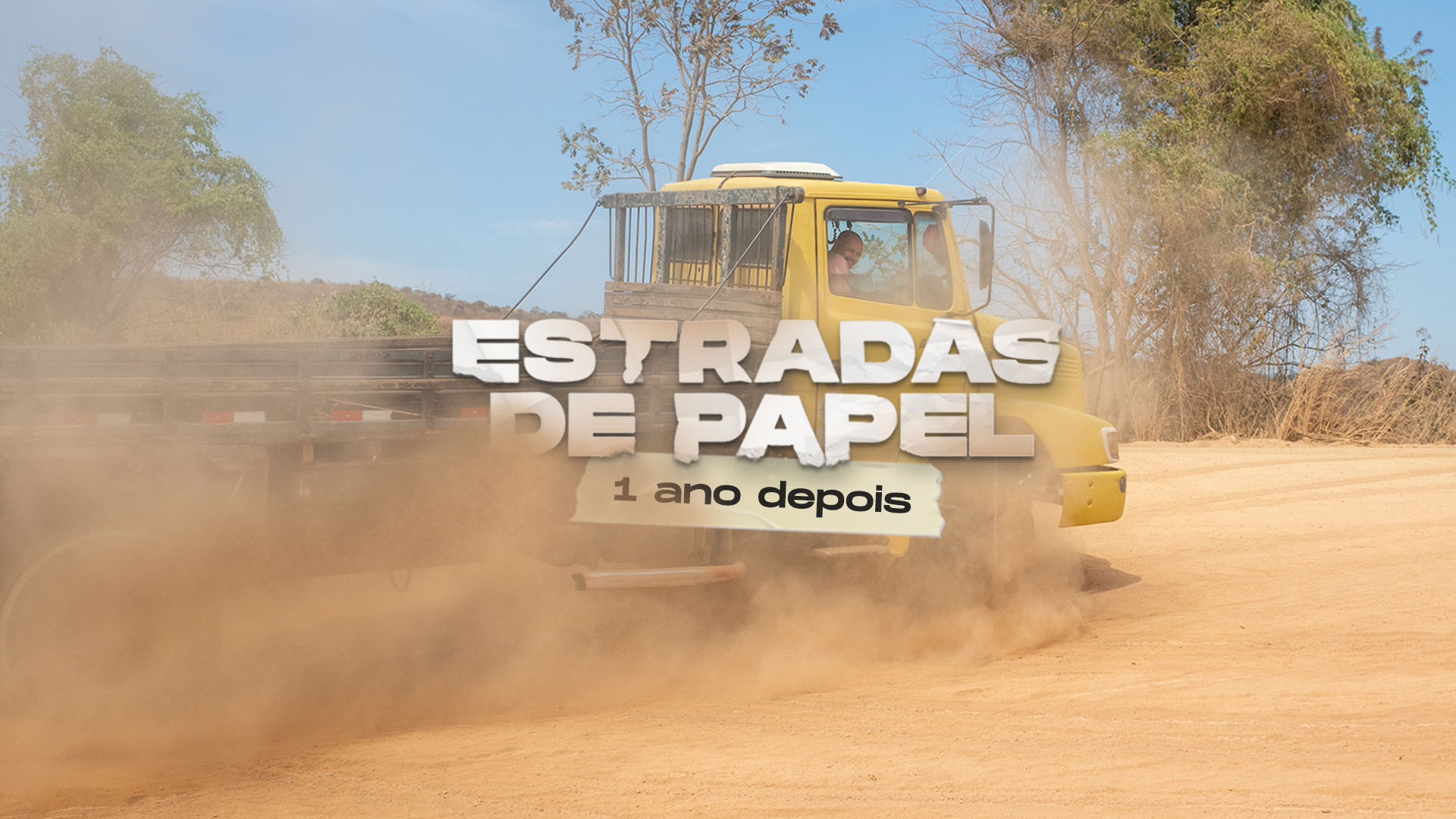Imagem de caminhão passando na estrada de terra