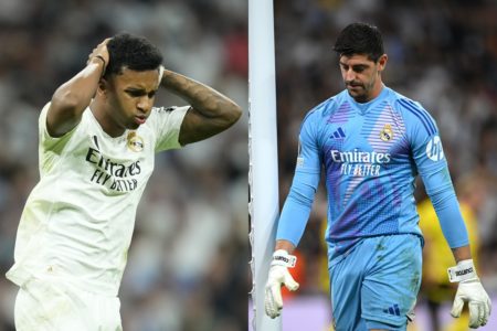 Foto colorida de Courtois e Rodrygo, do Real Madrid
