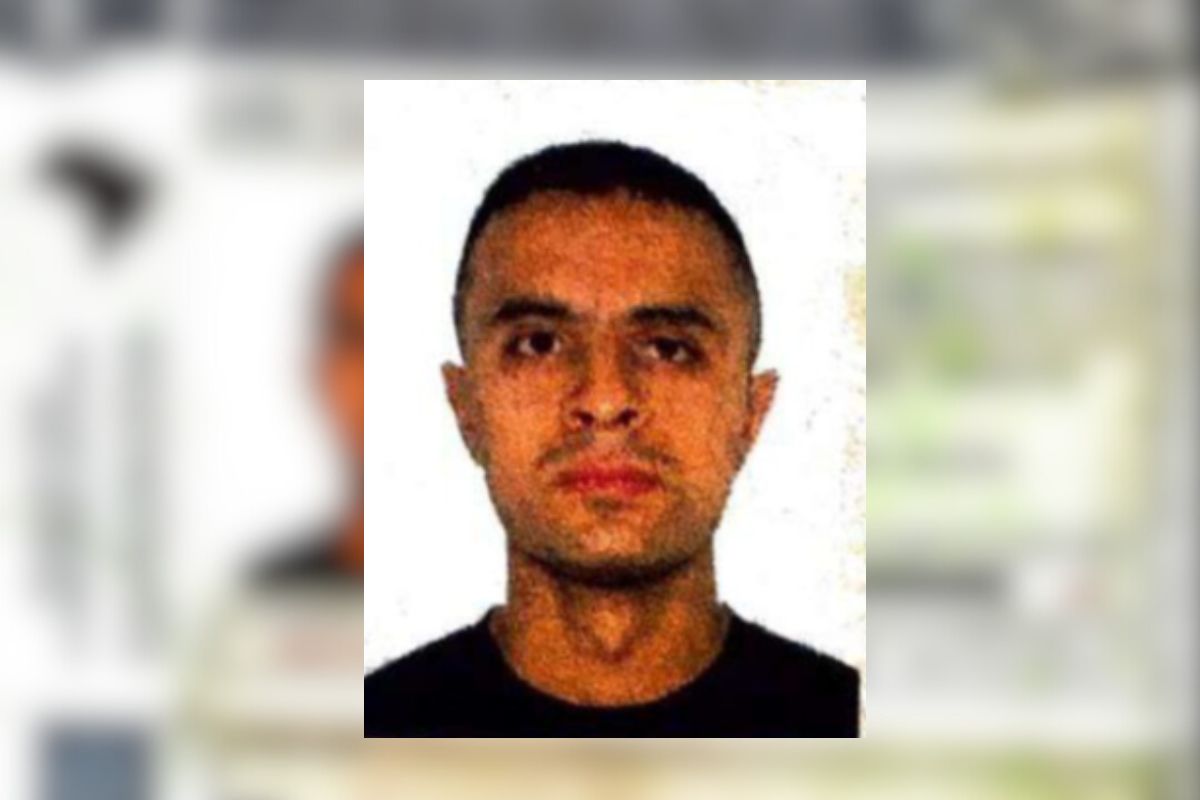 Imagens coloridas mostram foto 3x4 de homem branco, um policial militar suspeito de atirar e matar o delator do PCC Vinicius Gritzbach