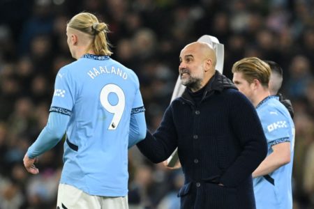 Imagem colorida de Haaland e Guardiola - Metrópoles