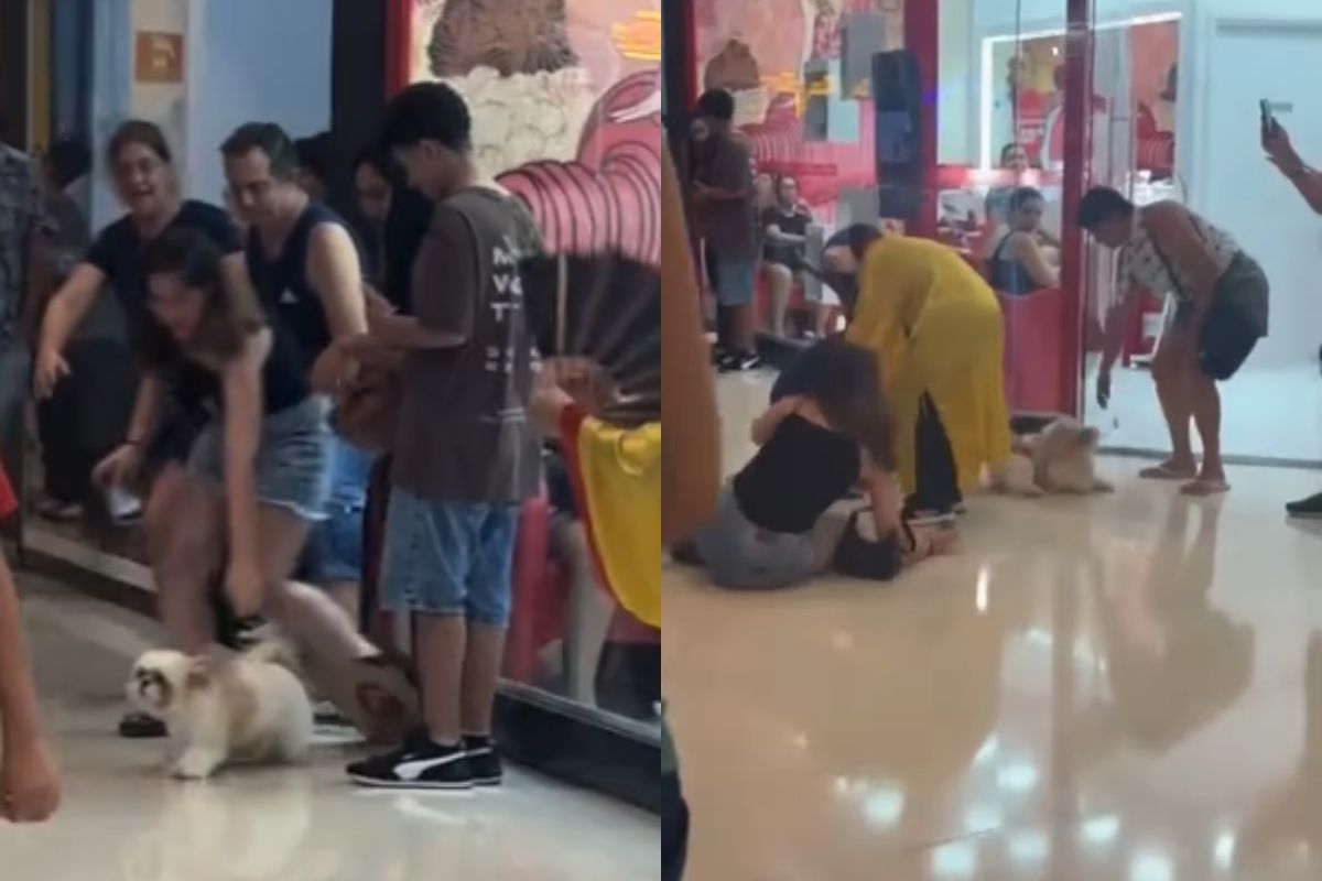 Foto colorida de uma mulher caindo no chão do shopping - Metrópoles